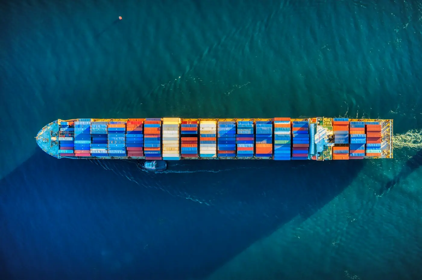 Aerial view of a loaded container ship at sea